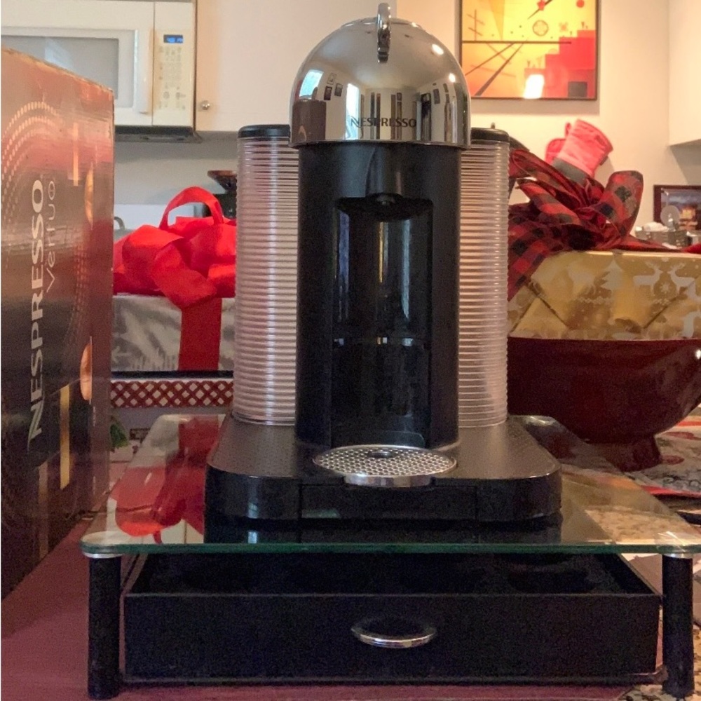 Nespresso Vertuo Machine like new with box and guide book.Pod holder $15